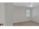 Neutral bedroom with plush carpeting, window with shutter blinds, and closet at 4366 Karls Gate Dr, Marietta, GA 30068