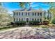 Beautiful two-story home with dormers and shutters, surrounded by mature landscaping at 4366 Karls Gate Dr, Marietta, GA 30068