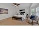 Serene bedroom with a bay window, ceiling fan, and neutral color palette at 4366 Karls Gate Dr, Marietta, GA 30068