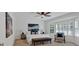 Main bedroom with neutral carpet, window with blinds, ceiling fan, and bench seat at 4366 Karls Gate Dr, Marietta, GA 30068