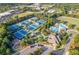 Community aerial view showcasing tennis courts, swimming pool, and clubhouse at 5724 Kendrick Ln, Cumming, GA 30041