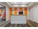 Finished basement featuring a colorful desk area with ample storage in a well-lit space at 5724 Kendrick Ln, Cumming, GA 30041