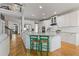 Spacious kitchen with a large island, stainless steel appliances, and ample counter space, ideal for cooking at 5724 Kendrick Ln, Cumming, GA 30041