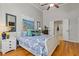 Comfortable main bedroom with a serene ambiance, features backyard views and easy access to the ensuite bath at 5724 Kendrick Ln, Cumming, GA 30041