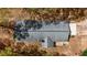 Aerial view of the home's roof, yard, and surrounding trees at 285 Glen Ne Rd, Conyers, GA 30013