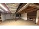 Spacious unfinished basement featuring a brick fireplace at 285 Glen Ne Rd, Conyers, GA 30013