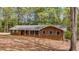 Charming brick ranch-style home with green shutters, offering a classic and inviting curb appeal at 285 Glen Ne Rd, Conyers, GA 30013