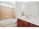 Full bathroom with tiled shower, vanity, and neutral decor at 322 Tupelo Tr Trl, Canton, GA 30114