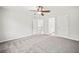 Bright bedroom with neutral tones, large windows, and easy access to the bathroom at 322 Tupelo Tr Trl, Canton, GA 30114