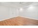 Spacious bedroom with tile floors, crown moulding, ceiling fan, and a large closet at 322 Tupelo Tr Trl, Canton, GA 30114