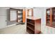 Spacious walk-in closet with custom shelving and ample storage, perfect for organization and convenience at 322 Tupelo Tr Trl, Canton, GA 30114