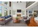 Cozy living room with fireplace, built-in shelving, and elegant decor at 322 Tupelo Tr Trl, Canton, GA 30114