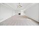Spacious living room with plush carpeting and fireplace at 322 Tupelo Tr Trl, Canton, GA 30114