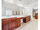 Dual vanity with sinks and storage with access to shower and closet in the main bathroom at 322 Tupelo Tr Trl, Canton, GA 30114