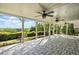 This expansive outdoor patio offers ample space, ceiling fans, and beautiful views at 322 Tupelo Tr Trl, Canton, GA 30114