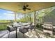 Enjoy the outdoors in this screened in patio with dining set, grill, and views at 322 Tupelo Tr Trl, Canton, GA 30114
