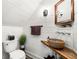 Chic powder room with stone sink, wood counter, and stylish fixtures at 4504 Union Hill Rd, Canton, GA 30115