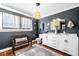Elegant bathroom with double vanity, hardwood floors, and stylish decor at 4504 Union Hill Rd, Canton, GA 30115
