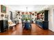 Charming dining room with a long wood table and decorative wall accents at 4504 Union Hill Rd, Canton, GA 30115