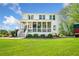 Charming two-story home with a spacious front yard, inviting porch, and white exterior at 4504 Union Hill Rd, Canton, GA 30115