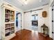 Charming hallway with hardwood floors, barn door, and custom bookcase at 4504 Union Hill Rd, Canton, GA 30115