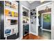 Efficient pantry area with modern appliances, shelving, and beverage storage at 4504 Union Hill Rd, Canton, GA 30115