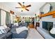 Cozy living room featuring a brick fireplace and comfortable sofa at 4504 Union Hill Rd, Canton, GA 30115