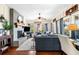 Cozy living room with lots of natural light, a brick fireplace, and hardwood floors at 4504 Union Hill Rd, Canton, GA 30115