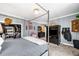 Comfortable main bedroom featuring soft grey walls, plush carpet, and access to a spacious closet at 4504 Union Hill Rd, Canton, GA 30115