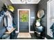 Stylish mud room features dark gray shiplap walls, a built-in bench, and a decorative mirror at 4504 Union Hill Rd, Canton, GA 30115