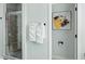 A neutral bathroom features a glass-door shower and minimalist decor at 1332 Nw Creekside Cir, Atlanta, GA 30318