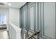 Hallway featuring wainscoting detail and a view to a sunlit room at 1332 Nw Creekside Cir, Atlanta, GA 30318