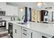 Bright and spacious kitchen with quartz countertops, a kitchen island, and modern stainless steel appliances at 1332 Nw Creekside Cir, Atlanta, GA 30318