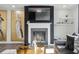 Stylish living room with modern fireplace, artwork, and comfortable seating at 1332 Nw Creekside Cir, Atlanta, GA 30318