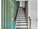 Staircase featuring custom trim work and neutral color scheme at 1332 Nw Creekside Cir, Atlanta, GA 30318
