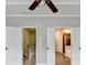 Inviting bedroom features plantation shutters, a ceiling fan, and a tray ceiling at 1668 Sabastian Ne Pt, Atlanta, GA 30329