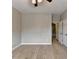 This bedroom features wood floors, neutral paint, and ceiling fan at 1668 Sabastian Ne Pt, Atlanta, GA 30329