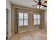 Bedroom with two windows, a ceiling fan, and natural light at 1668 Sabastian Ne Pt, Atlanta, GA 30329