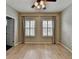 Bedroom with two windows, a ceiling fan, and wood floors at 1668 Sabastian Ne Pt, Atlanta, GA 30329