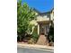 Charming two-story townhome with a welcoming entryway and well-manicured landscaping at 1668 Sabastian Ne Pt, Atlanta, GA 30329