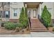 Inviting front entrance with brick stairs and lush landscaping at 1668 Sabastian Ne Pt, Atlanta, GA 30329