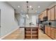 Modern kitchen featuring a granite island, stainless appliances, and custom cabinets at 1668 Sabastian Ne Pt, Atlanta, GA 30329