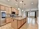 Modern kitchen with stainless steel appliances, a granite island, and maple cabinets at 1668 Sabastian Ne Pt, Atlanta, GA 30329