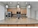 Modern kitchen featuring a granite island, maple cabinets, and stainless steel appliances at 1668 Sabastian Ne Pt, Atlanta, GA 30329