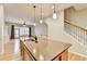 Bright kitchen with granite island, stainless steel appliances, and open floor plan at 1668 Sabastian Ne Pt, Atlanta, GA 30329