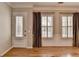 Bright living room featuring hardwood floors, modern windows, and elegant trim at 1668 Sabastian Ne Pt, Atlanta, GA 30329