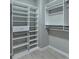 A walk-in closet featuring custom shelving and storage solutions at 1668 Sabastian Ne Pt, Atlanta, GA 30329