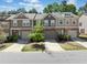 Charming townhouse exterior with well-maintained landscaping and neutral color scheme at 5157 Madeline, Stone Mountain, GA 30083