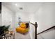 Upstairs hallway with sitting area near bedrooms, features carpeted floors and natural light at 5157 Madeline, Stone Mountain, GA 30083