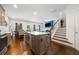 Open concept kitchen with a center island, stainless appliances and hardwood floors at 5157 Madeline, Stone Mountain, GA 30083